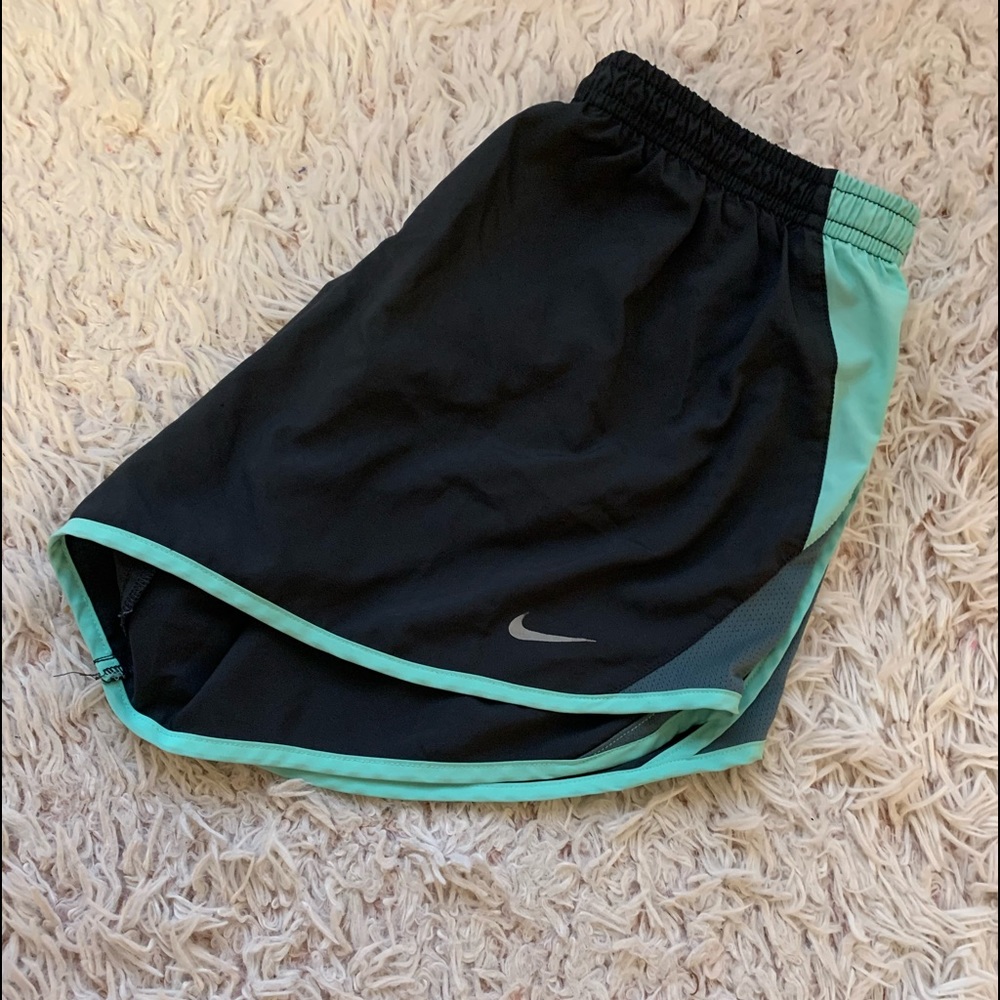 Black and teal like Nike shorts.
